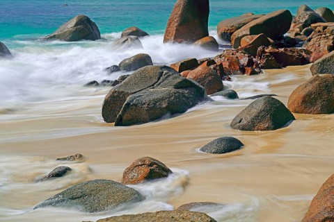 Beach and granite rocks at Anse Possession