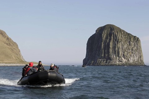 Zodiac inflatable boat with tourists at sea