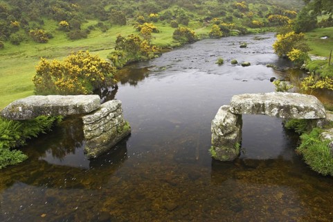 Ruined rattle bridge over the river