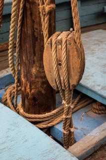 Rope in wooden pulley