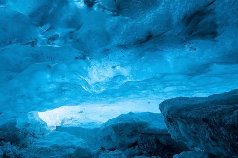 Blue ice mixed with volcanic ash in ice cave inside Breidamerkurjokull