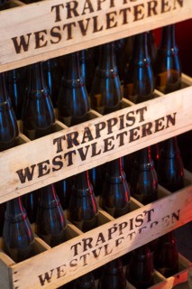 Stacked wooden beer crates with Trappist Westvleteren bottles