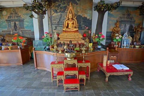 Buddha statue on an altar in a prayer room of the Buddhist monastery Brahma Vihara