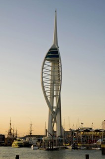 View of harbour and waterfront with Spinnaker Tower in evening light