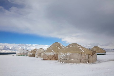 Yurts in a traditional Kyrgyz yurt camp in the snow at Song Kul