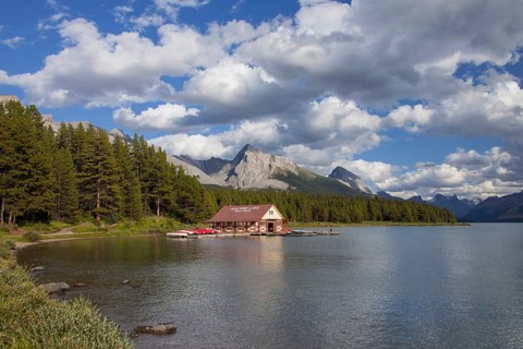 Boathouse with canoes at Maligne Lake