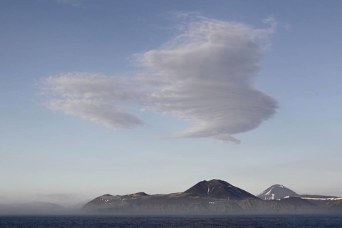 View of the volcanic island coast at dawn