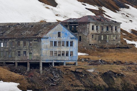 Dilapidated buildings of the abandoned Russian mining settlement in Svalbard