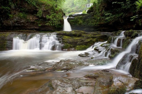 View of river with cascades and waterfall