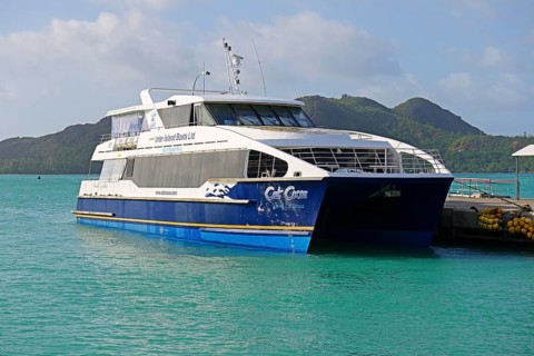 Catamaran ferry of the operator Cat Cocos in the harbour of Praslin Island