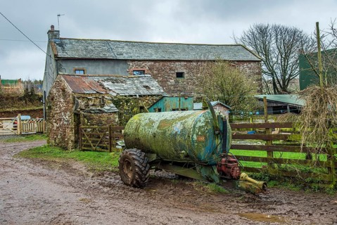 Slurry tanker and farm building