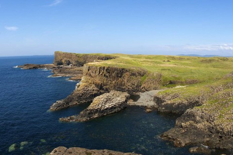 View of coastline with cliffs and columnar basalt rocks