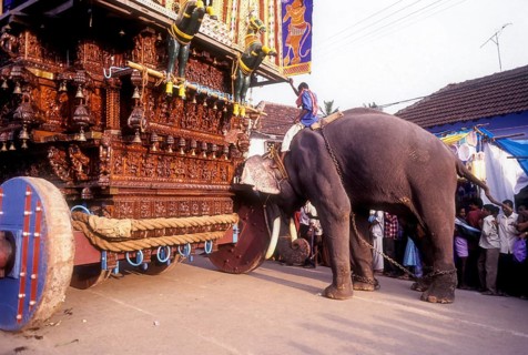 Elephant pushing the chariot in Radhotsavam or temple chariot festival in Kalpathy near Palakkad