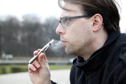 Man with e-cigarette