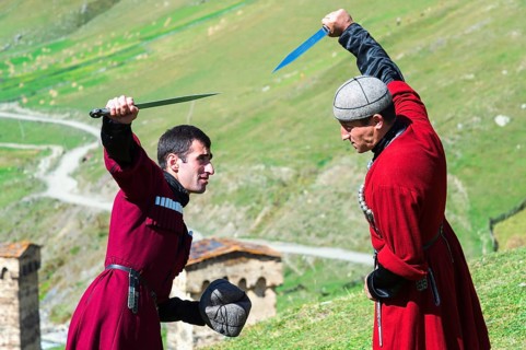 Dagger fighting demonstration by two Georgian men of a folklore group