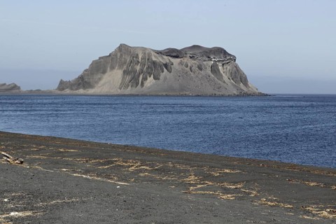 View of volcanic sand on the beach