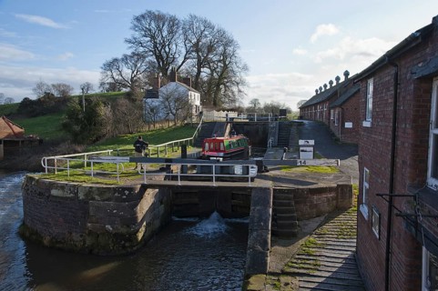 Narrowboat passing through the canal lock