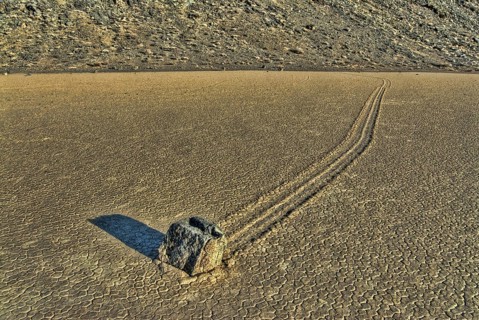 'Sailing stones' geological phenomenon of rocks moving along tracks on valley floor
