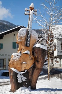 Wooden sculpture of a violin