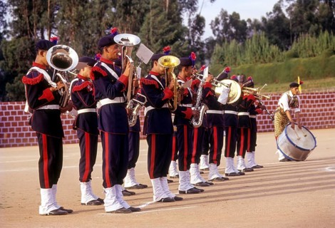 Students Beating retreat during Founder's Day Parade
