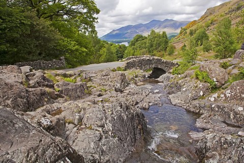 Rocky stream and stone bridge