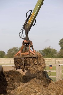 Removal of horse manure from the stable yard