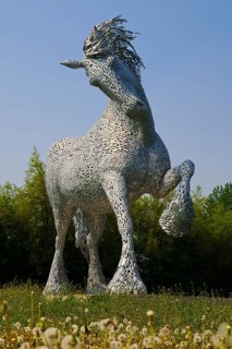 Metal Sculpture of a Gypsy Cob Horse on a Carousel