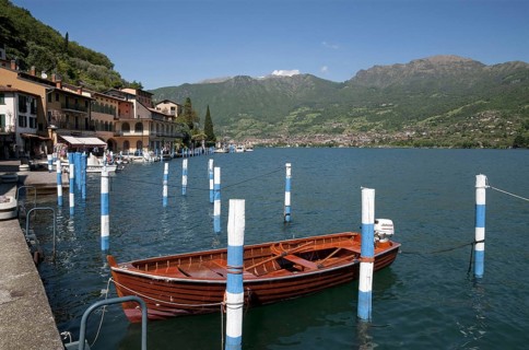 Boats in the harbour of the town on the lake island