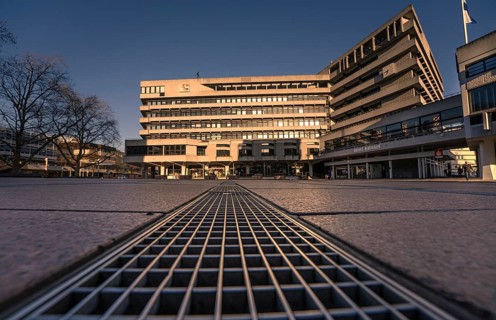 View over ground grids of the historic town hall in the evening light