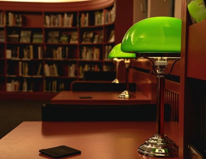Historic green reading lamp in the city library