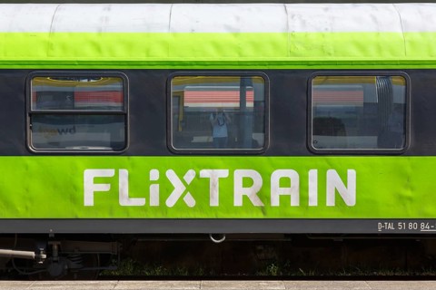 Flixtrain logo on a train at the main station in Stuttgart