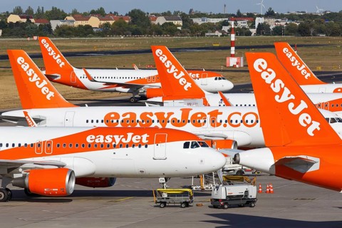 Tails of Airbus A320 aircraft of EasyJet at Tegel Airport in Berlin