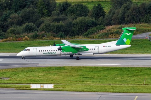 A De Havilland Canada Dash 8 Q400 aircraft of Wideroe with registration LN-WDG at Bergen Airport