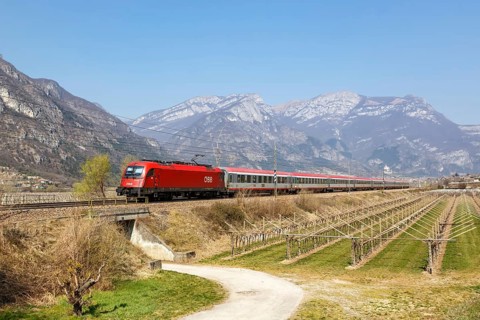 OeBB EuroCity train on the Brenner railway near Avio in Italy