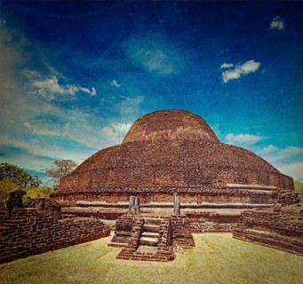 Vintage retro hipster style travel image of ancient Buddhist dagoba