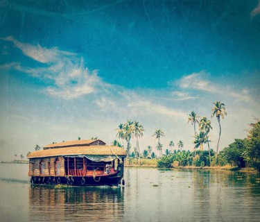 Vintage retro hipster style travel image of travel tourism Kerala background