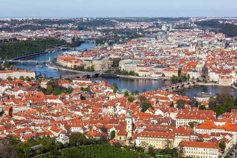 Aerial view of Charles Bridge over Vltava river and Old city from Petrin hill Observation Tower. Prague
