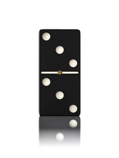 Domino game bone close up isolated on white