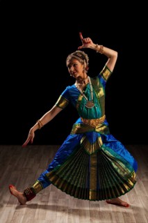 Young beautiful woman dancer exponent of Indian classical dance Bharatanatyam