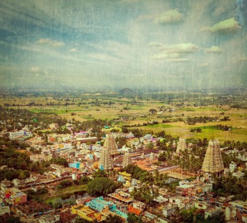 Vintage retro hipster style travel image of Lord Bhakthavatsaleswarar Temple with grunge texture overlaid