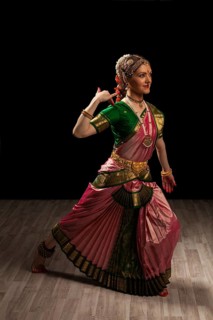 Young beautiful woman dancer exponent of Indian classical dance Bharatanatyam