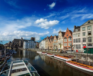 Travel Belgium medieval european city town background with canal. Koperlei street