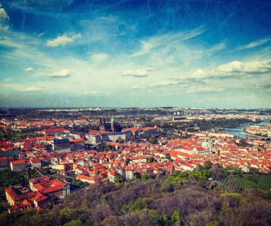 Vintage retro hipster style travel image of aerial view of Hradchany part of Prague: the Saint Vitus