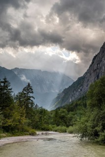 Torrener Ache in the Bluntau valley with dramatic clouds
