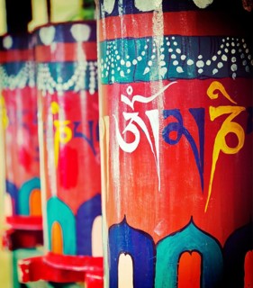 Vintage retro effect filtered hipster style travel image of Buddhist prayer wheels. Tsuglagkhang complex in McLeod Ganj