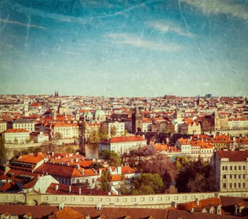Vintage retro hipster style travel image of aerial view of Prague from Prague Castle. Prague