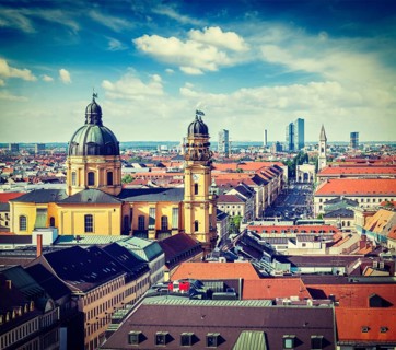 Vintage retro effect filtered hipster style travel image of aerial view of Munich over Theatine Church of St. Cajetan Theatinerkirche St. Kajetan and Odeonplatz