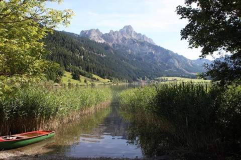 Haldensee with view of Gimpel and Rote Flueh in the Tannheim Valley