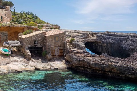 Fishermen's huts in Cala de s'Almonia