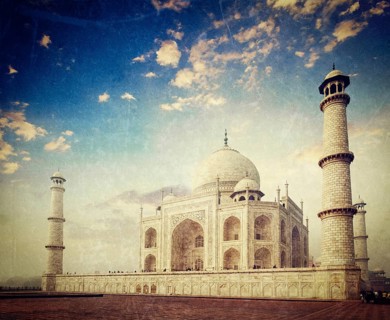 Vintage retro hipster style travel image of Taj Mahal on sunrise. Indian Symbol